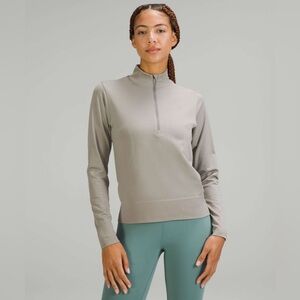 Lululemon women’s Swifly Relaxed Half Zip. Size 6